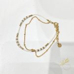 خلخال مع احجار باللون الابيض والذهبي