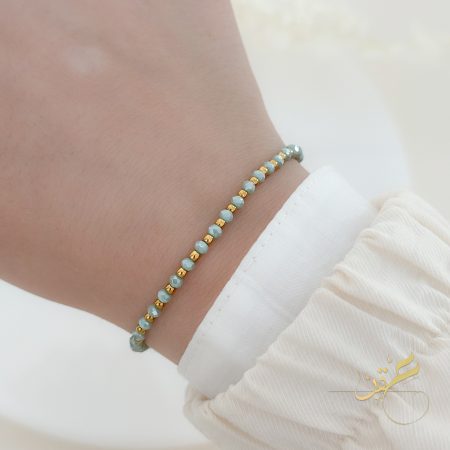 اسوارة باحجار باللون الفيروزي و الذهبي