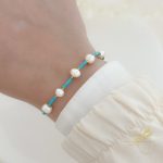 اسوارة مع حجر لون التركواز وحبات لولو طبيعية