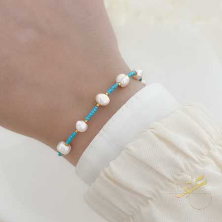 اسوارة مع حجر لون التركواز وحبات لولو طبيعية