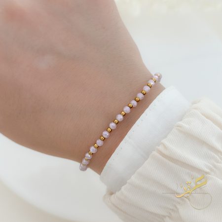 اسوارة مع احجار لون زهري بارد مع ذهبي