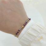 اسوارة مع احجار لون بنفسجي مع ذهبي