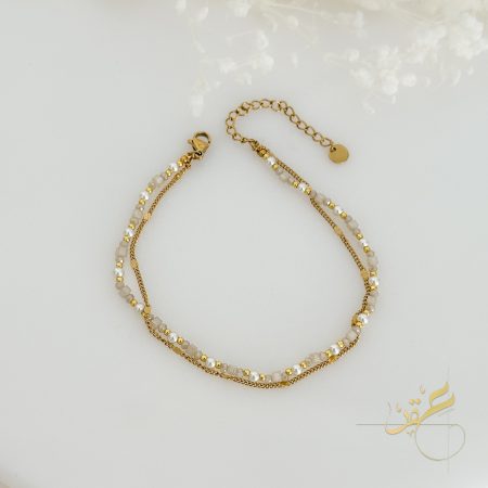 خلخال مع أحجار بتدرجات اللون البيج وسلسلة ذهبية