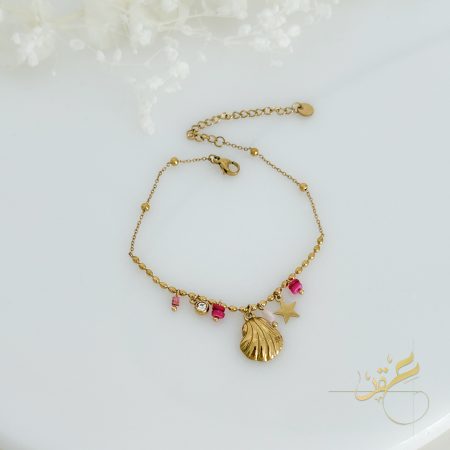 خلخال الصدفة مع احجار باللون الفوشي