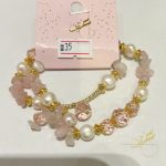 اسوارة لف باحجار اللون الزهري ولولو المياه العذبة