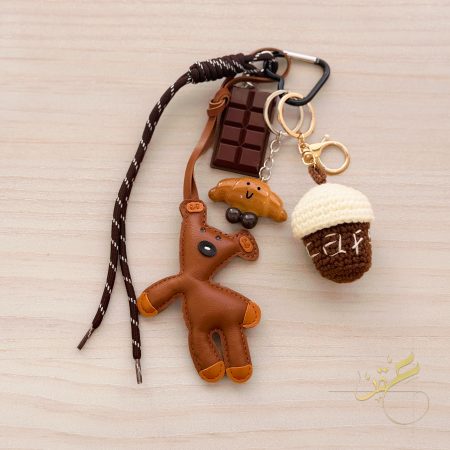 مدالية الدب والكرواسون والشوكولاته