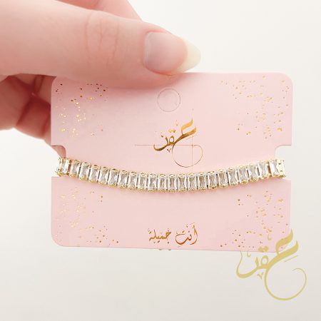 اسوارة ستايل تنس باحجار مستطيلة لون ذهبي