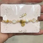 اسوارة باحجار باللون العسلي واللولو والذهبي